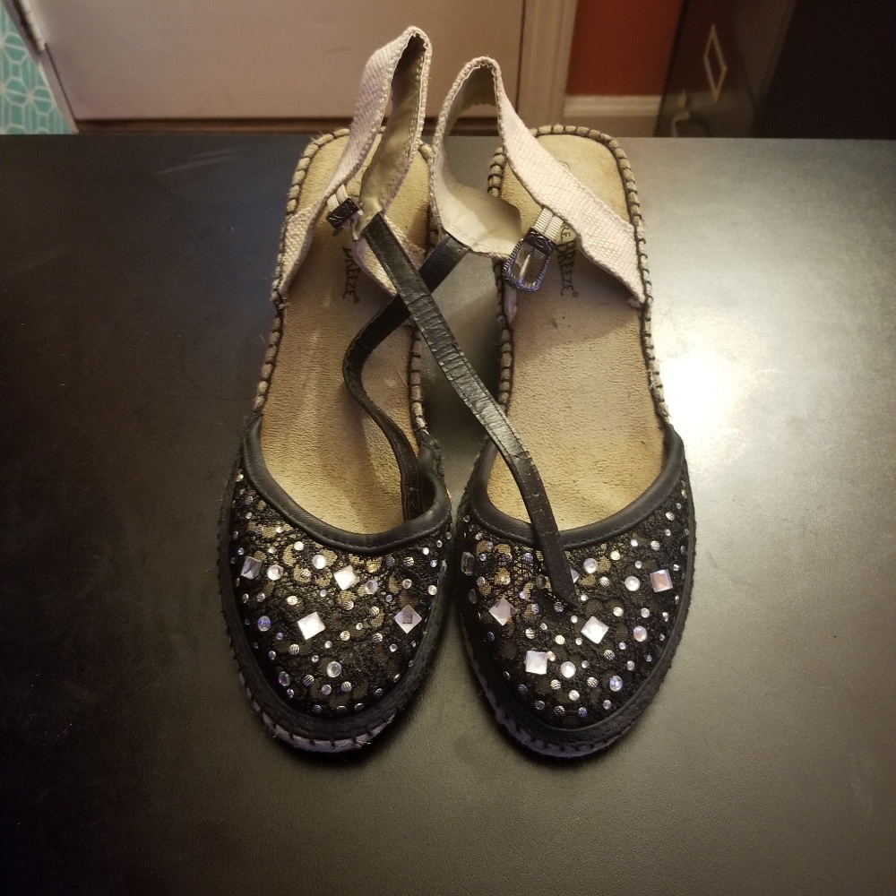 Shoes black in color with some bling. No box.